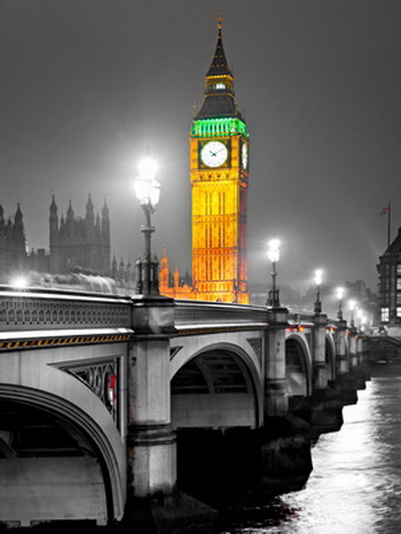 The Big Ben, the House of Parliament and the Westminster Bridge at night, London, UK.