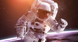 Astronaut in outer space against the backdrop of the planet